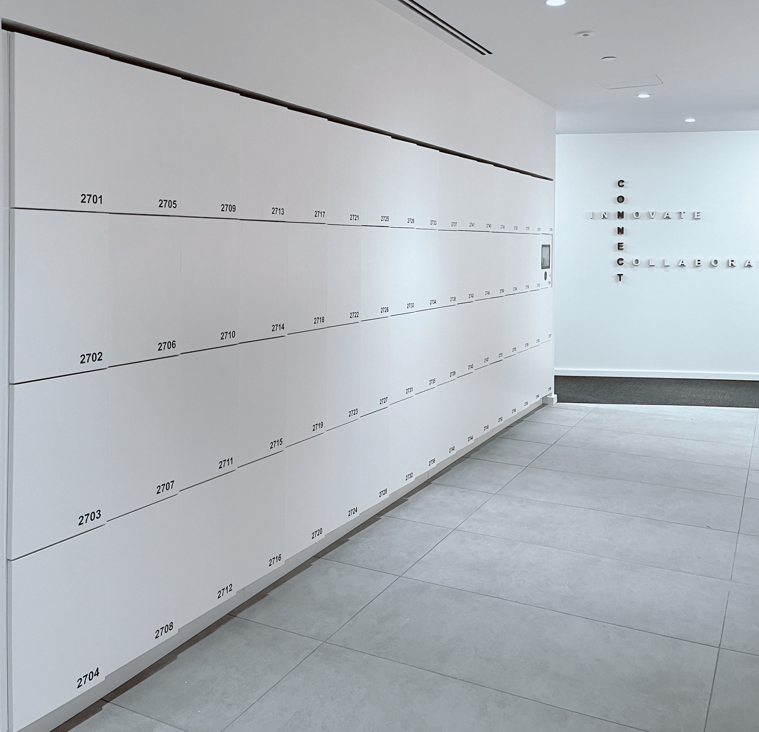 White wall smart locker bank in a modern office